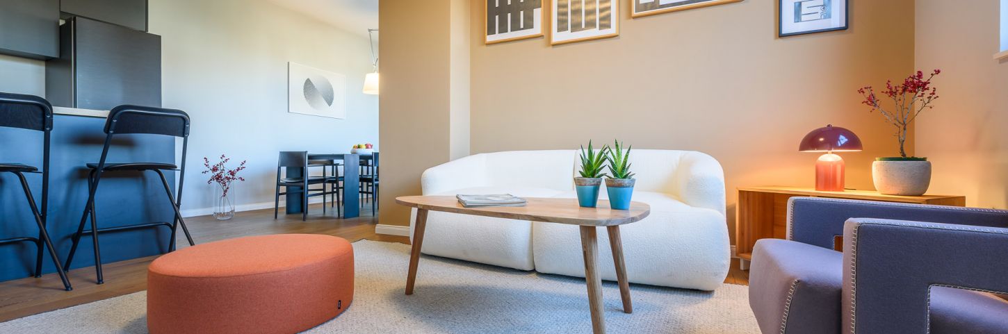 CHARMING IN NEW BUILDING.